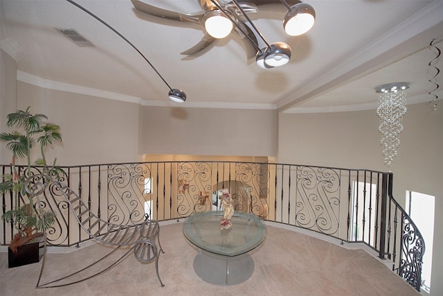 interior space featuring carpet floors and ornamental molding