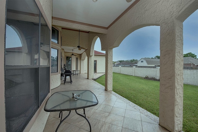 view of patio with ceiling fan