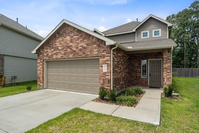 view of front of home with a garage and a front lawn