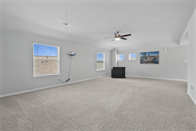 interior space featuring carpet flooring and ceiling fan