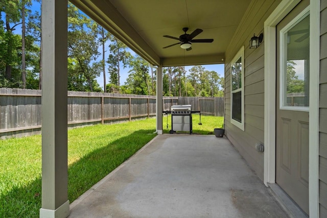 view of patio / terrace with ceiling fan and a grill