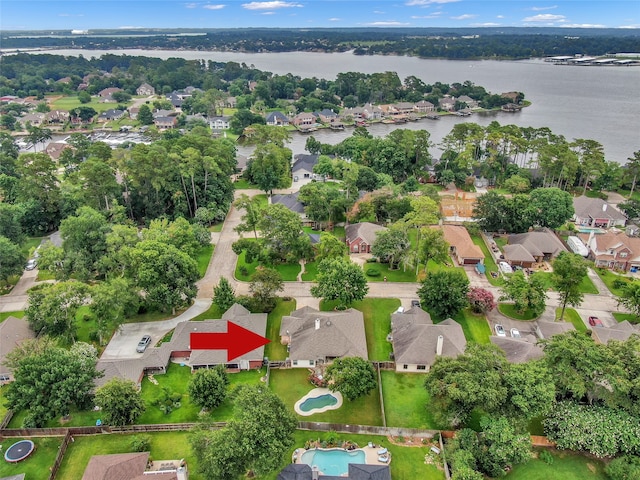 birds eye view of property featuring a water view