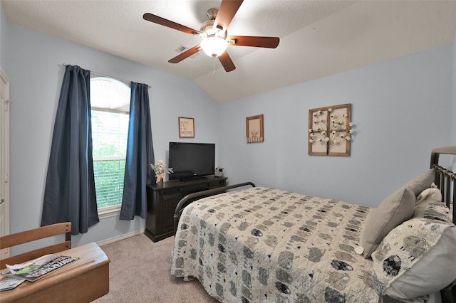 bedroom with light carpet, lofted ceiling, and ceiling fan