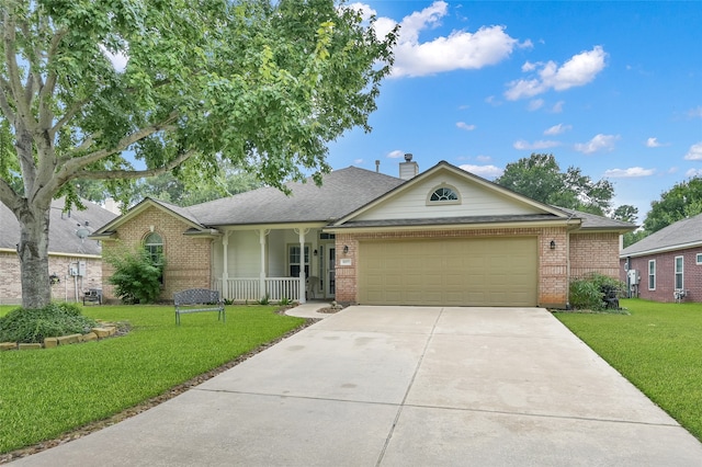 single story home featuring a garage and a front yard