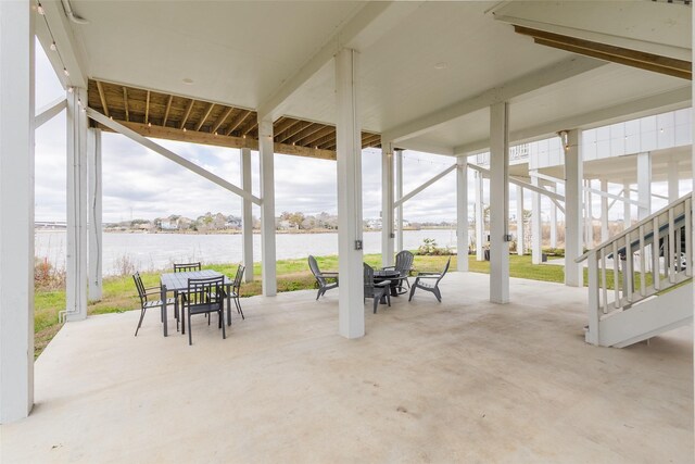 view of patio / terrace with a water view