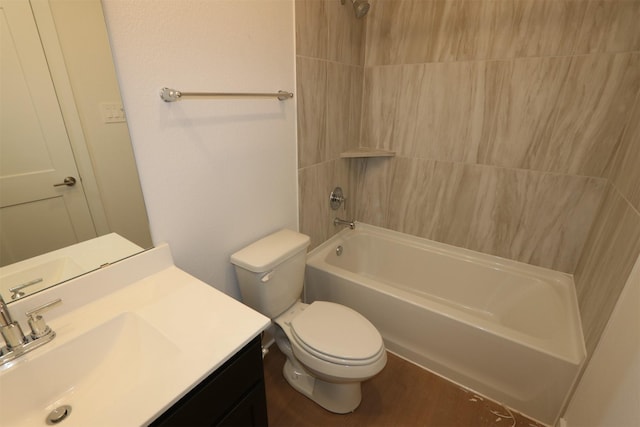 full bathroom with washtub / shower combination, vanity, and toilet