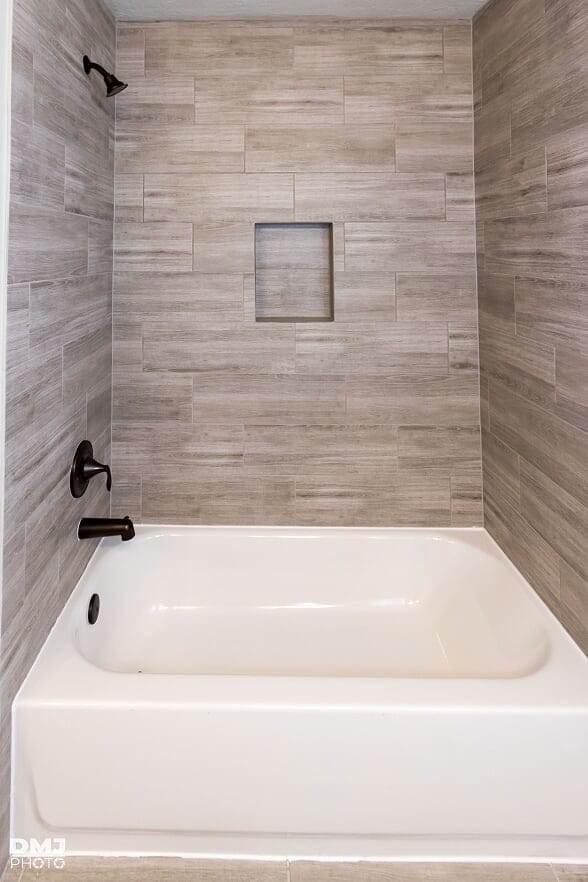 bathroom with shower / bathing tub combination