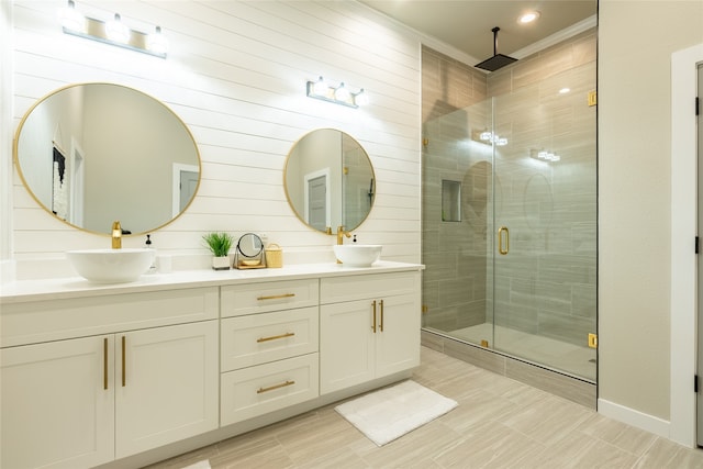 bathroom featuring vanity, crown molding, walk in shower, and wooden walls