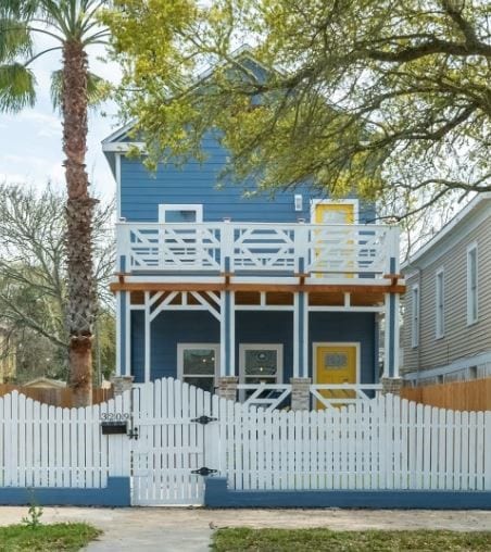 view of front of house featuring a balcony