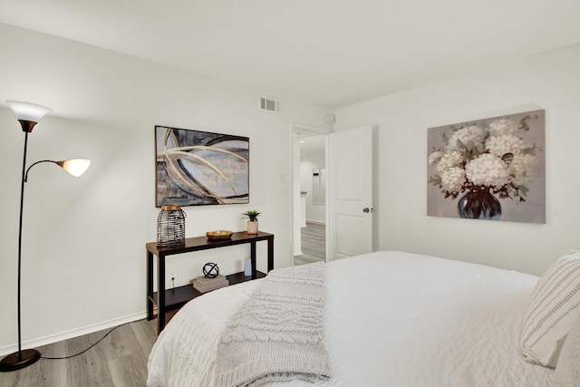 bedroom featuring hardwood / wood-style flooring