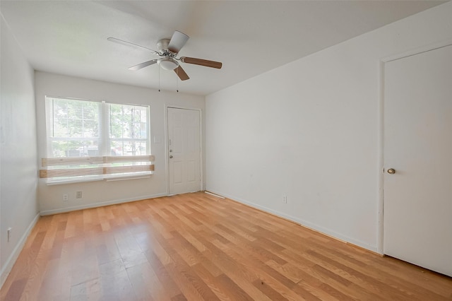 unfurnished room with light hardwood / wood-style floors and ceiling fan