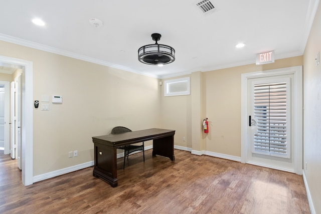 home office featuring crown molding and hardwood / wood-style floors