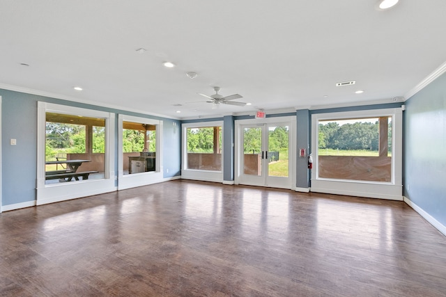 17018 Grant Rd, Cypress, TX 77429 - unfurnished living room featuring crown molding, healthy amount of natural light, baseboards, recessed lighting, and ceiling fan
