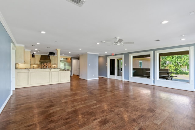 unfurnished living room with ceiling fan, ornamental molding, french doors, and wood-type flooring