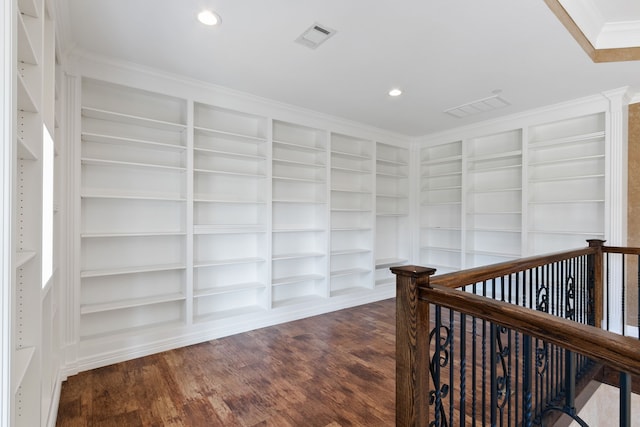 17018 Grant Rd, Cypress, TX 77429 - hall featuring built in features, dark wood-style floors, ornamental molding, and recessed lighting
