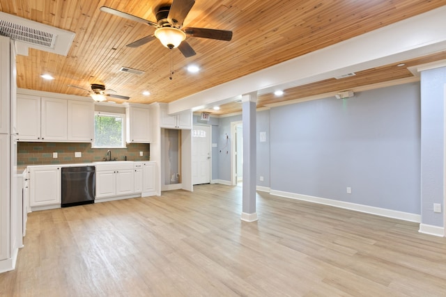 kitchen with black dishwasher, light hardwood / wood-style flooring, backsplash, and white cabinetry