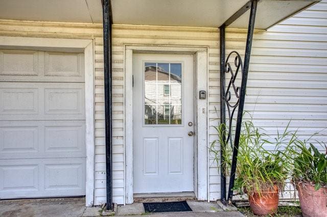 entrance to property with a garage