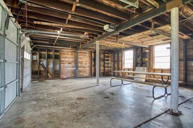 miscellaneous room with a healthy amount of sunlight and a garage