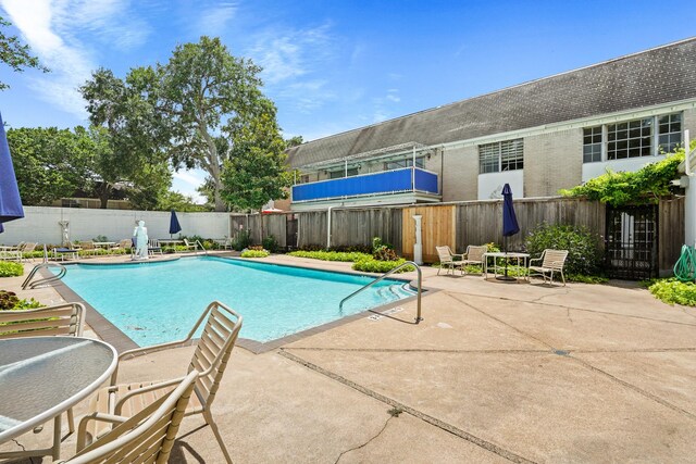 view of pool with a patio area