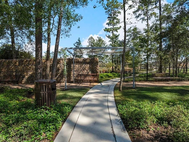 view of home's community with a pergola