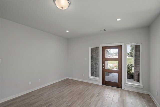 foyer with light hardwood / wood-style flooring