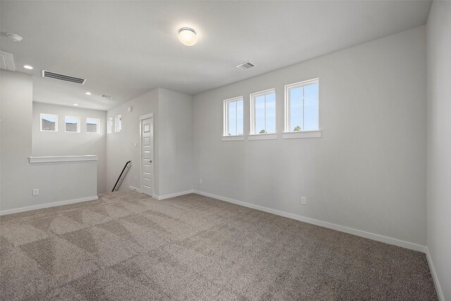 spare room with carpet flooring