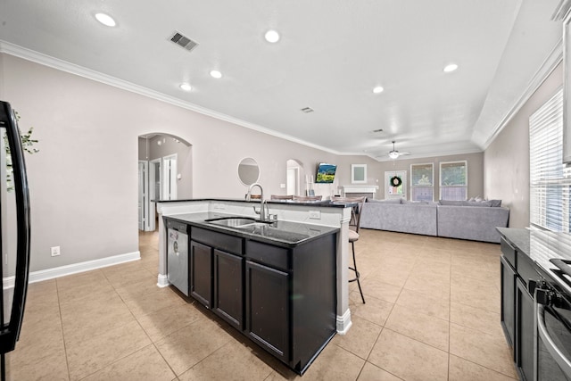 kitchen featuring dishwasher, an island with sink, ornamental molding, ceiling fan, and sink