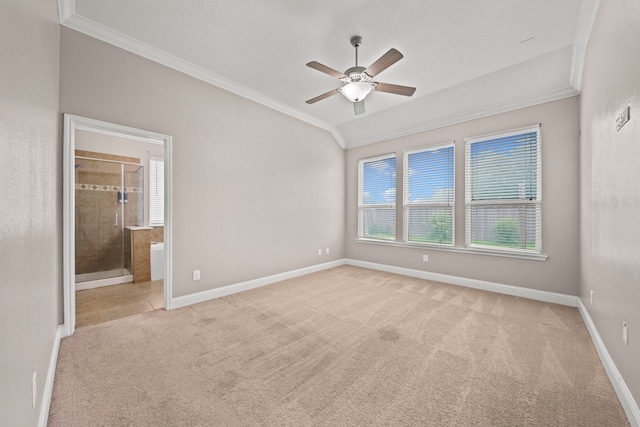 interior space with connected bathroom, ceiling fan, crown molding, and light colored carpet