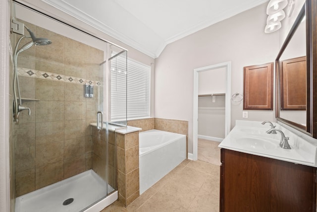 bathroom with tile patterned flooring, crown molding, vanity, lofted ceiling, and shower with separate bathtub