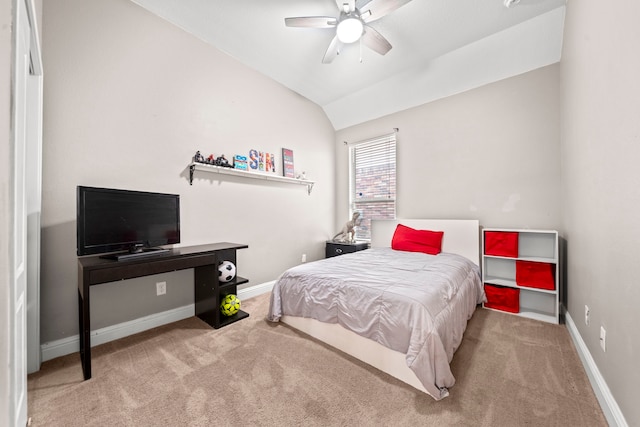 bedroom featuring lofted ceiling, ceiling fan, and carpet