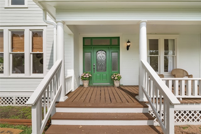 doorway to property with covered porch