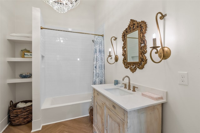 bathroom featuring vanity, a notable chandelier, shower / tub combo with curtain, and parquet floors