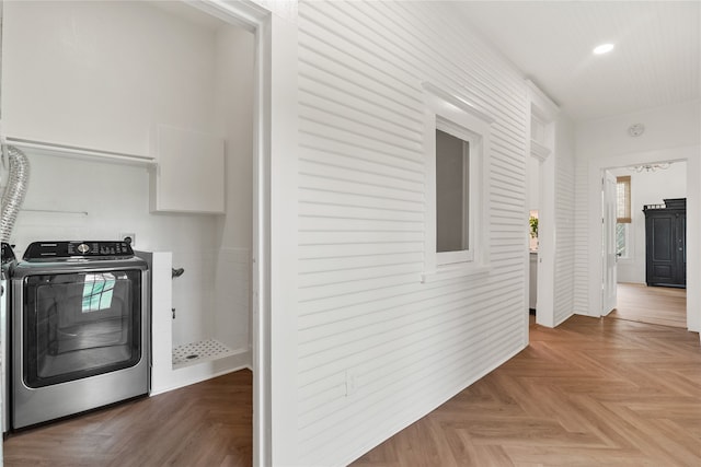 interior space with washer / clothes dryer and light parquet flooring