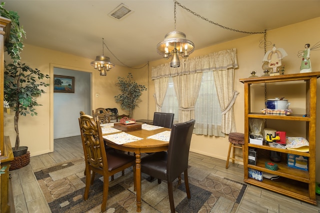 dining area featuring hardwood / wood-style flooring