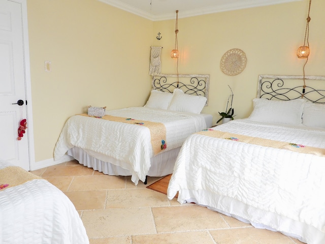 bedroom with ornamental molding