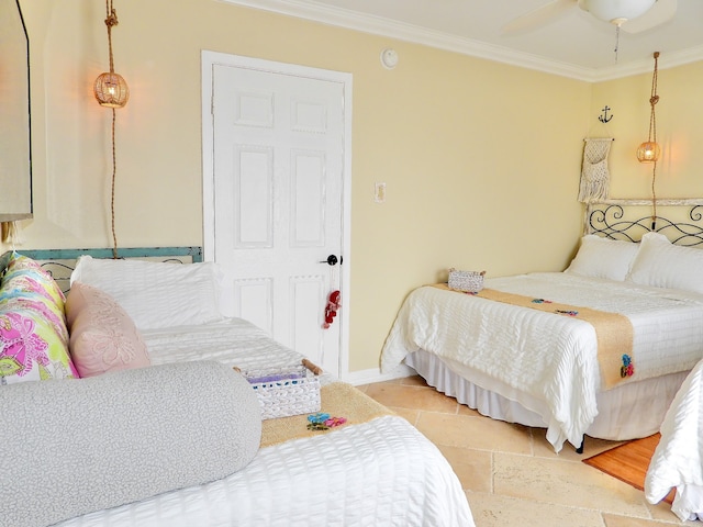 bedroom featuring ceiling fan and crown molding