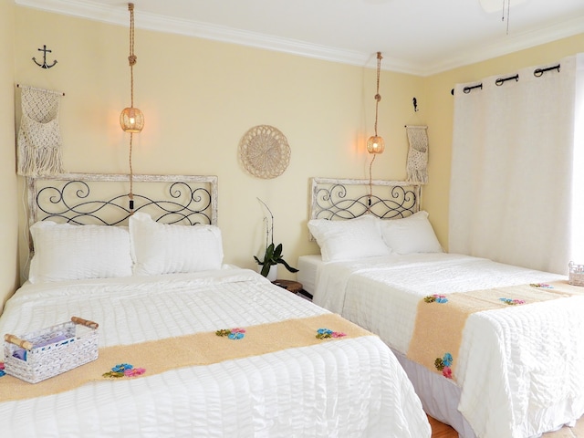 bedroom featuring crown molding