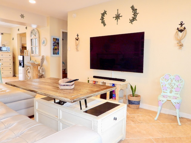 living room featuring light tile patterned floors