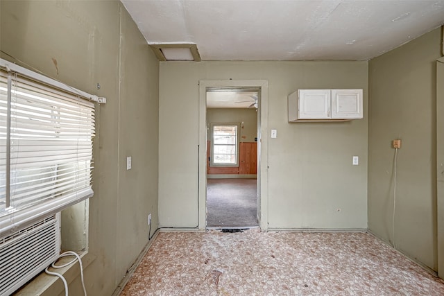 spare room featuring carpet flooring