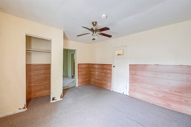 unfurnished bedroom with carpet and ceiling fan