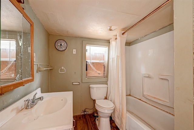 full bathroom featuring a healthy amount of sunlight, wood-type flooring, shower / bathtub combination with curtain, and toilet