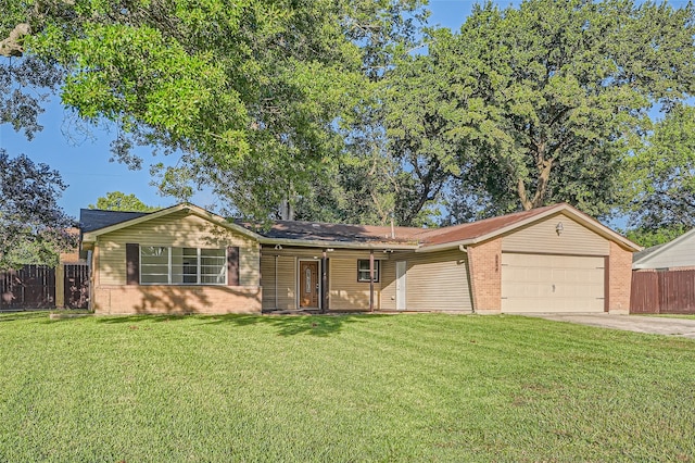 ranch-style house with a garage and a front lawn