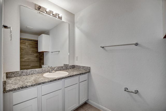 bathroom with vanity and tile patterned floors