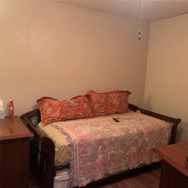 bedroom featuring hardwood / wood-style floors