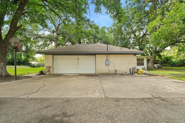 view of property exterior featuring brick siding and a yard