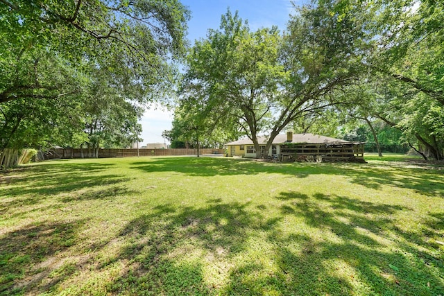 view of yard with fence