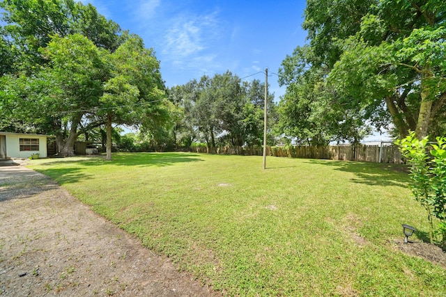 view of yard featuring fence