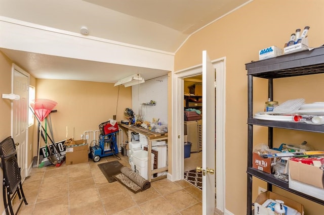 basement featuring light tile flooring