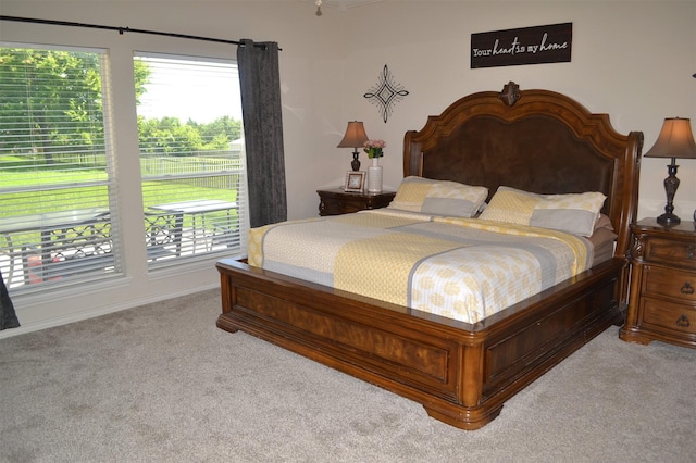 bedroom with light carpet