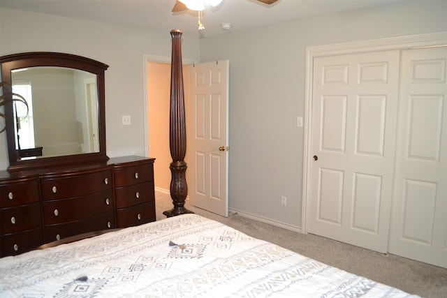 unfurnished bedroom featuring a closet, ceiling fan, and light colored carpet